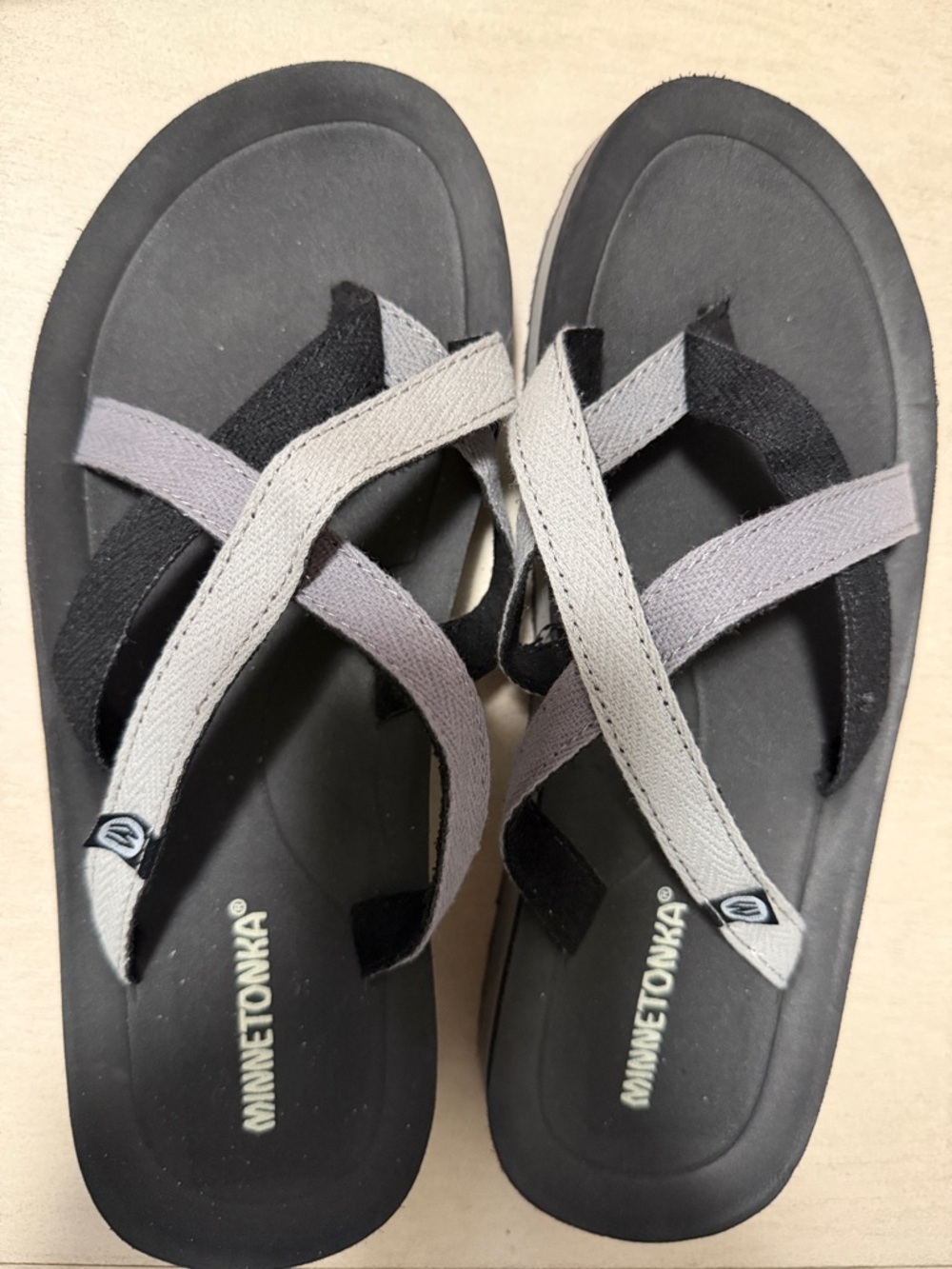 Minnetonka Black Footbed with Gray Crisscross Strap Sandals